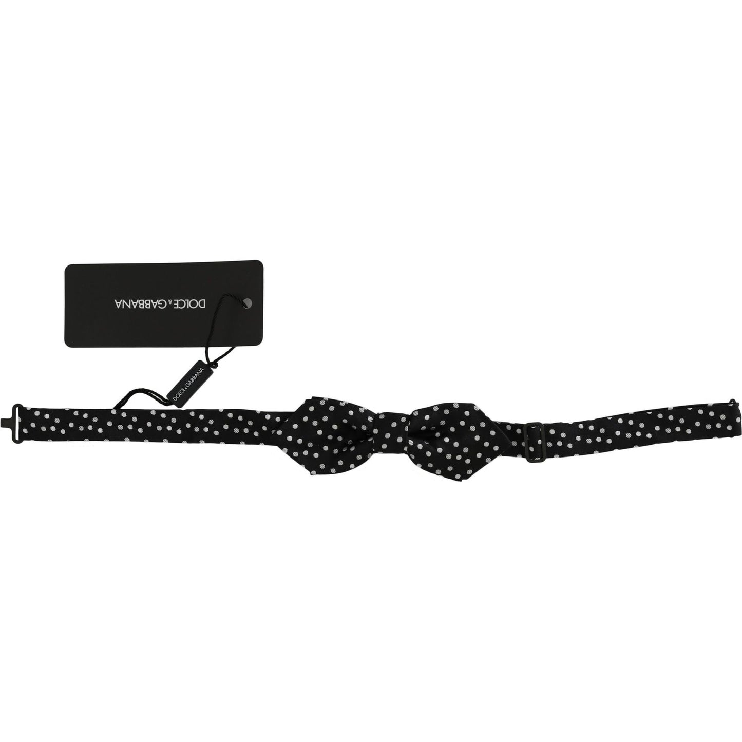 Dolce Gabbana black polka dot bow tie displayed with adjustable strap and tag, made from 100% silk.
