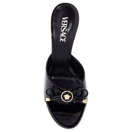 Versace 'opera bow patent leather mules Mules Versace