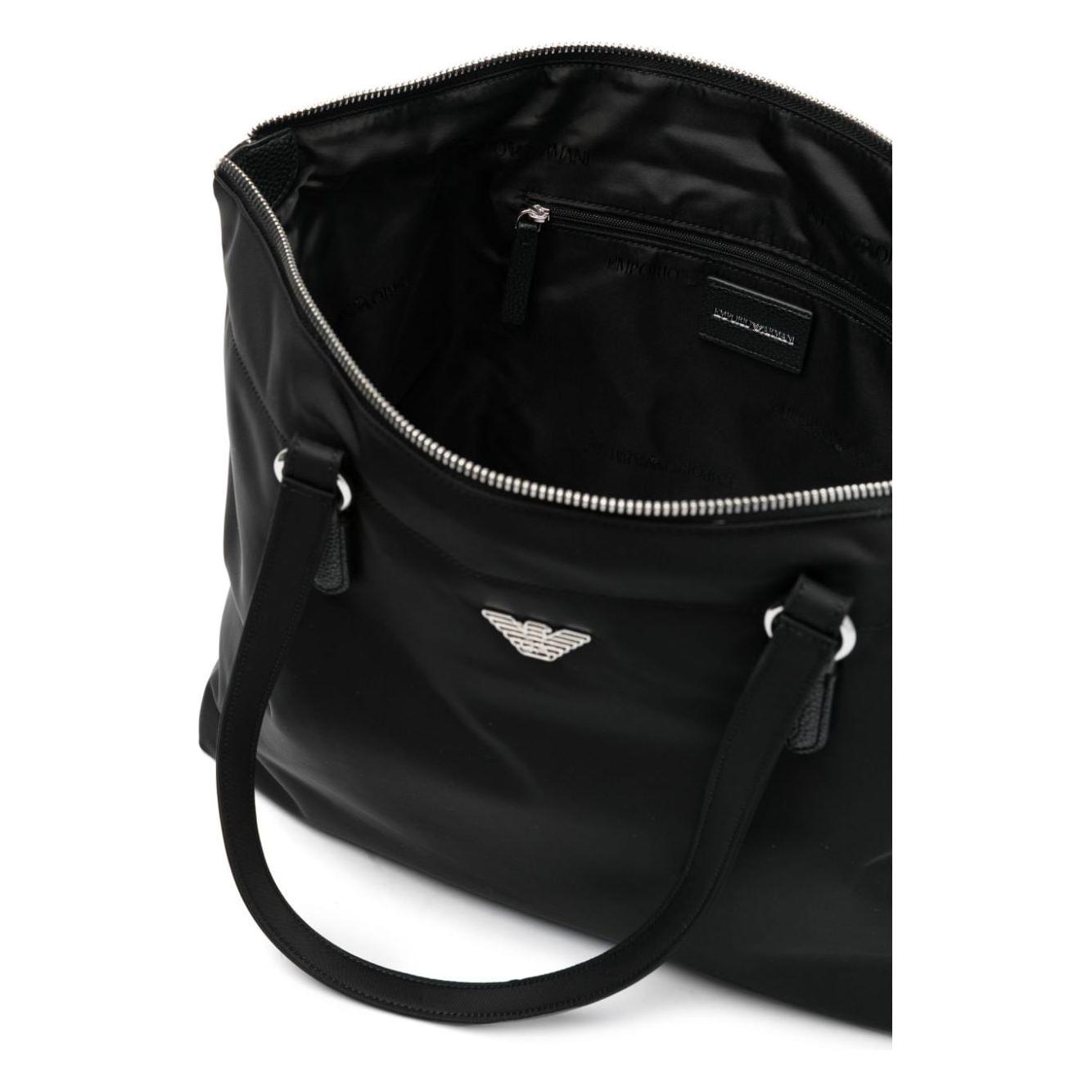 Front view with bag zipped and handles upright.