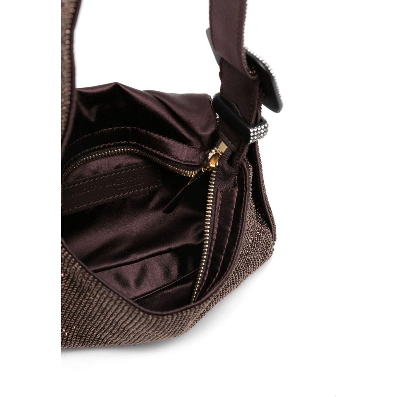 Front view with bag zipped and handles upright.