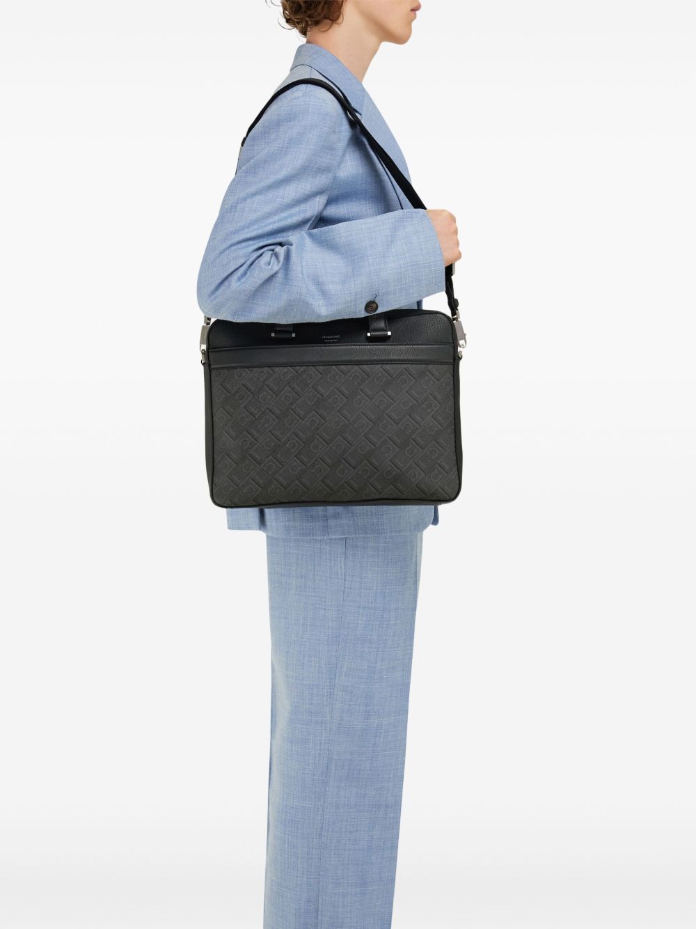 Front view with bag zipped and handles upright.