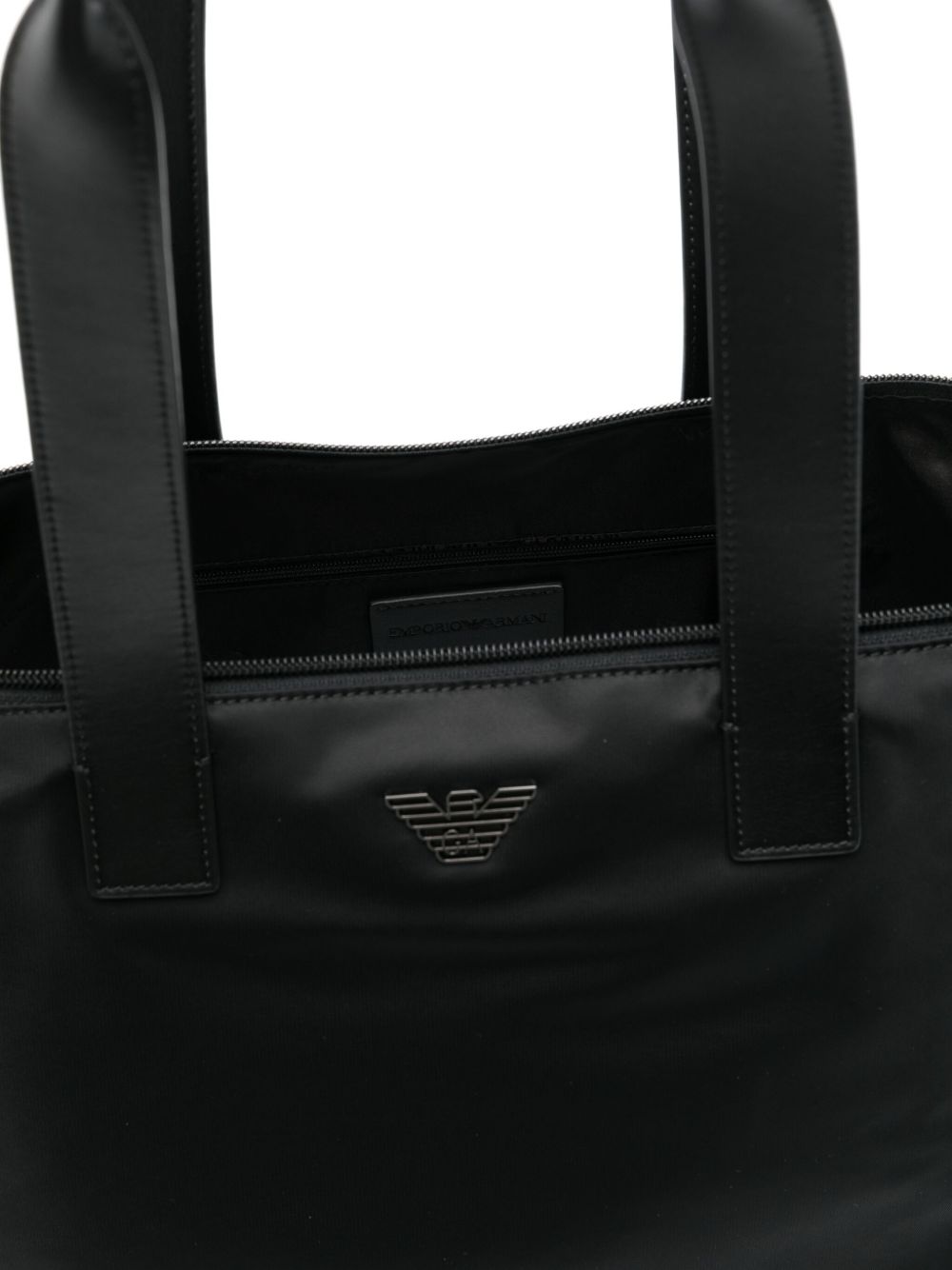 Front view with bag zipped and handles upright.