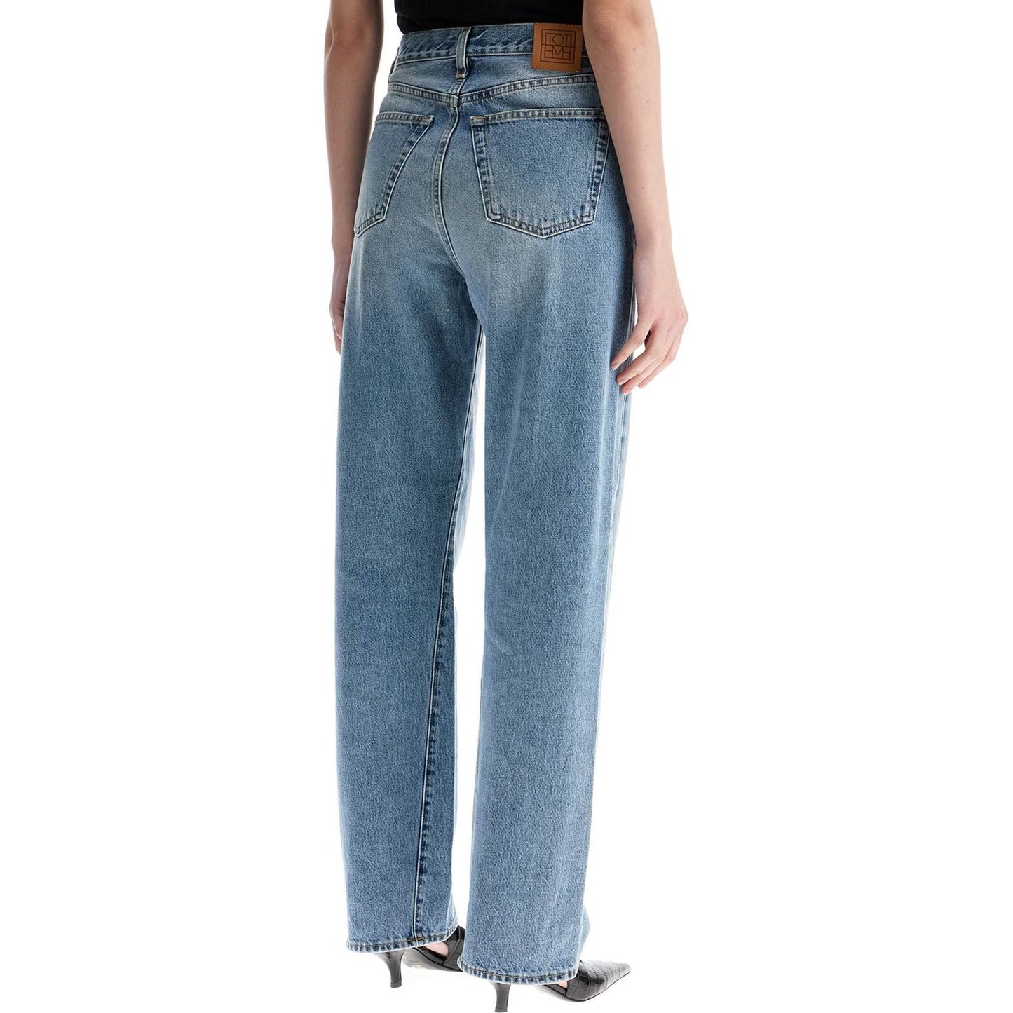 Toteme wide leg organic cotton jeans in worn blue with twisted seams Jeans Toteme