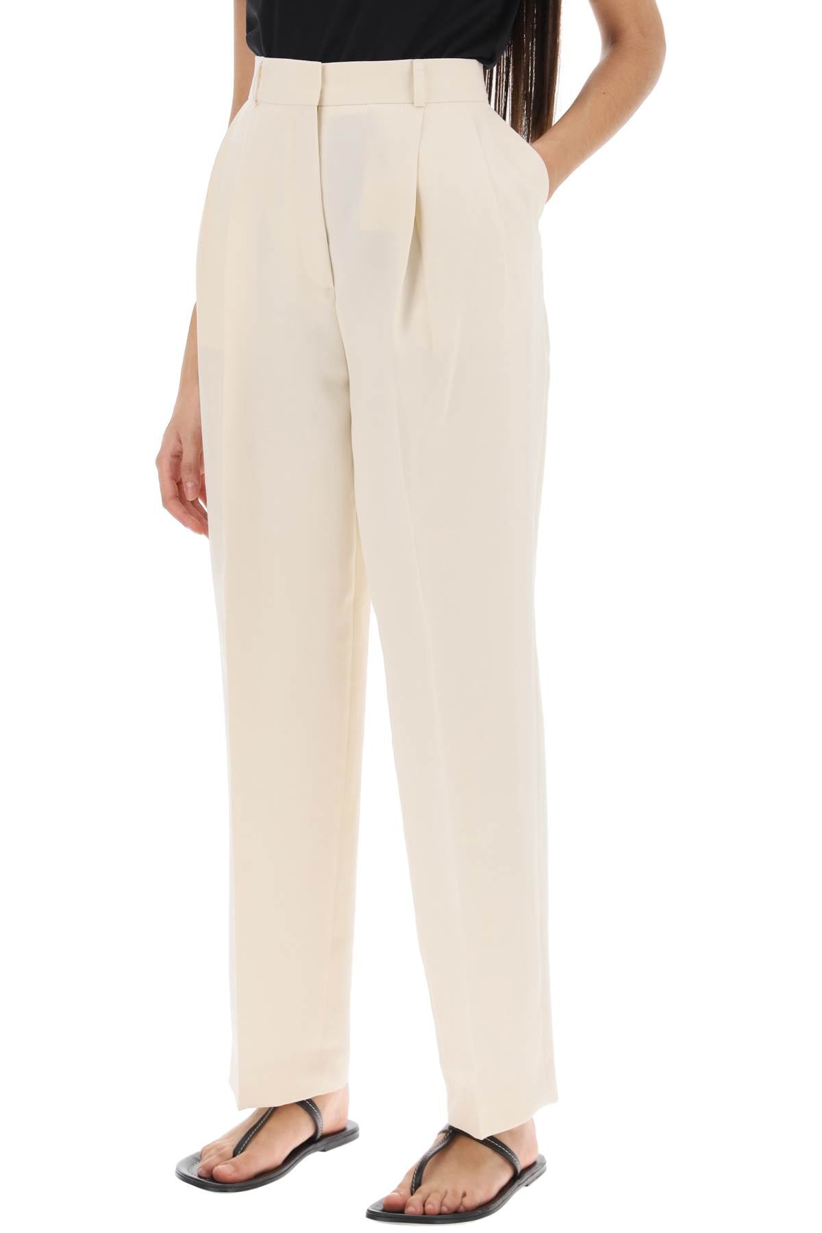 Toteme double-pleated viscose trousers Trousers Toteme