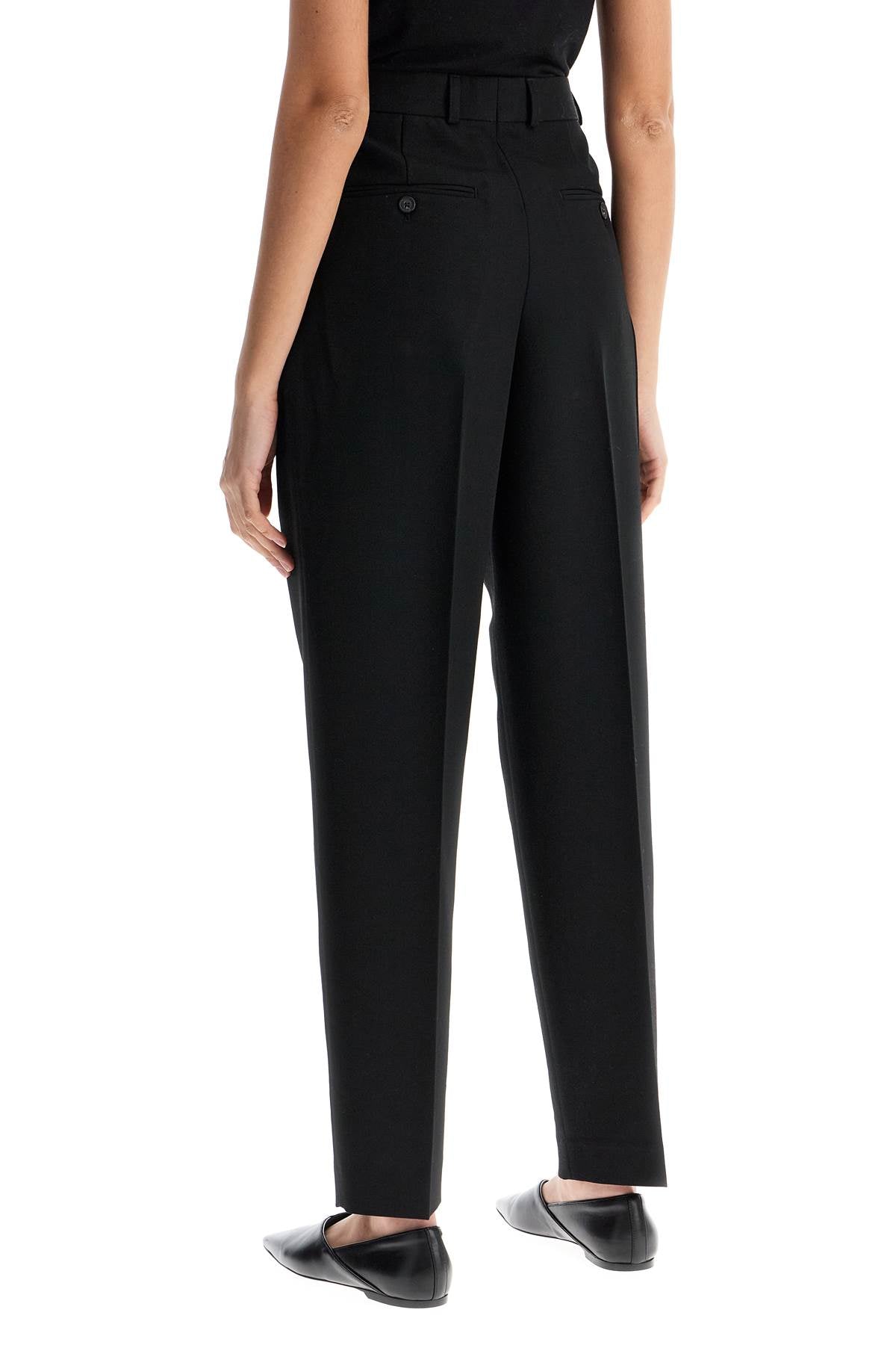 Toteme tailored high-waisted wide-leg pants black sustainable materials Trousers Toteme