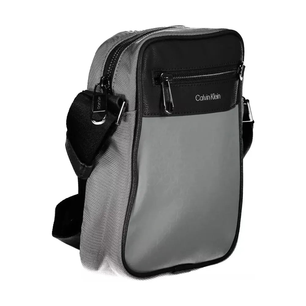 Front view with bag zipped and handles upright.