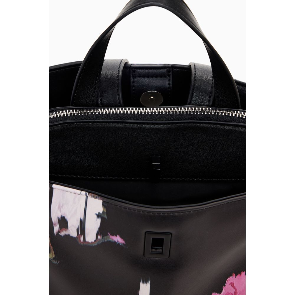 Front view with bag zipped and handles upright.