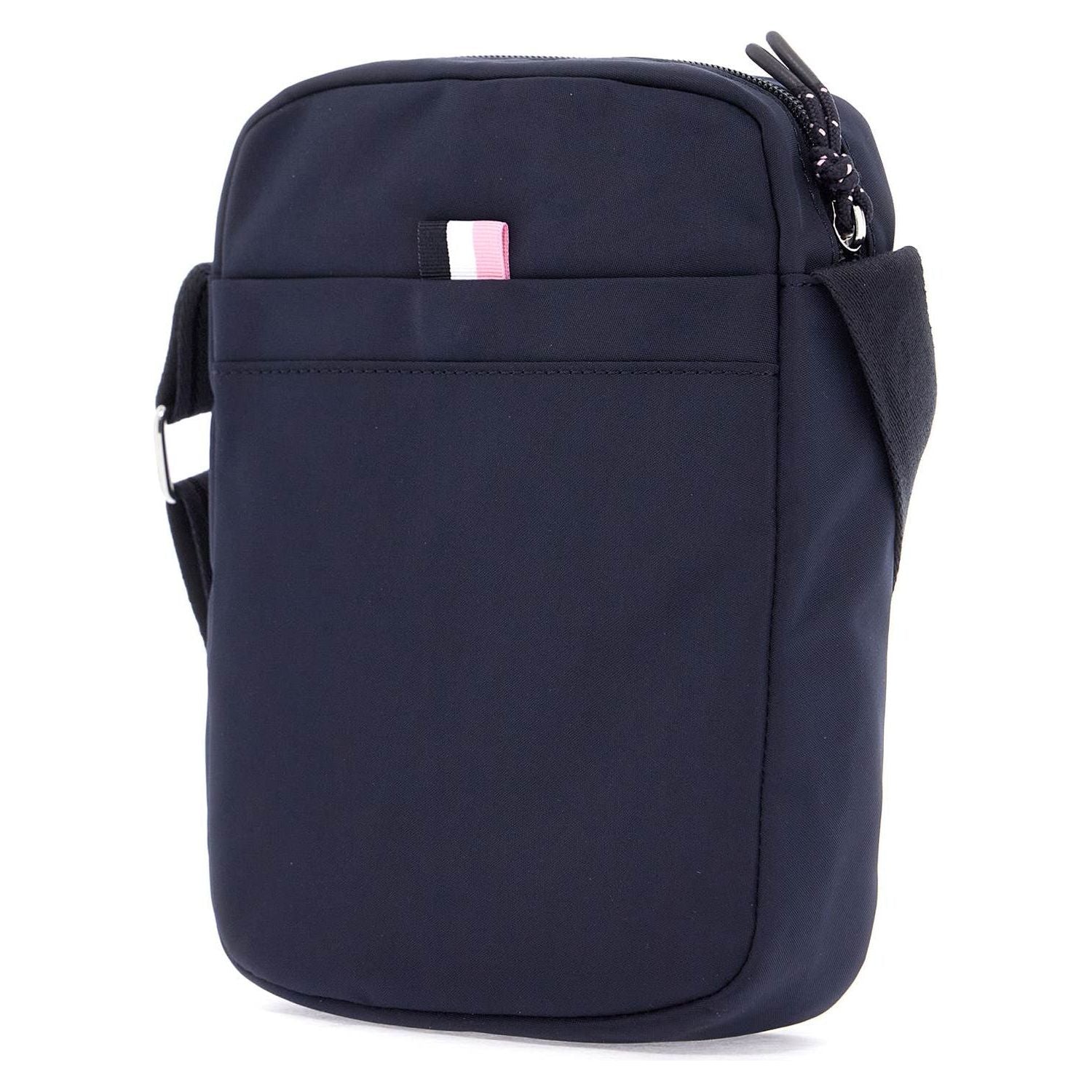 Front view with bag zipped and handles upright.