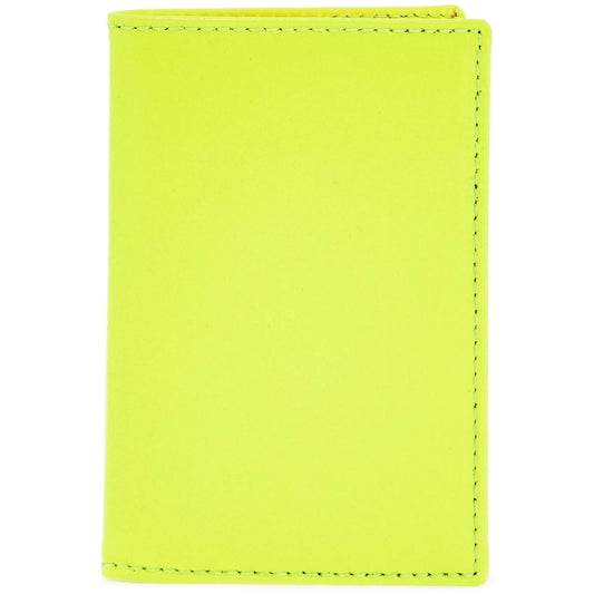 Comme Des Garcons Wallet compact wallet in fluorescent yellow goat leather Wallets Comme Des Garcons Wallet